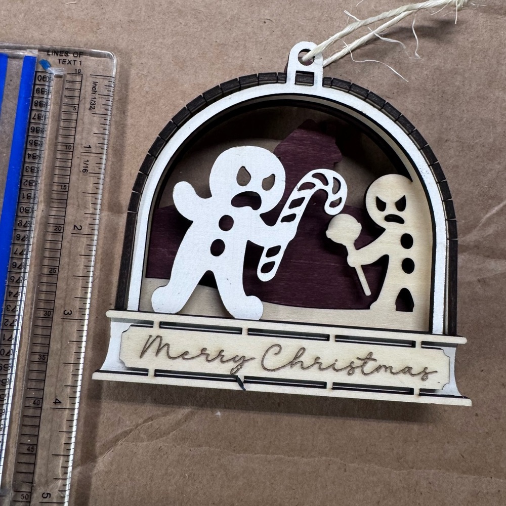 3/$20 Layered Wooden Gingerbread Ornament – Funny Christmas Cookie Fight Scene - Picture 3 of 4
